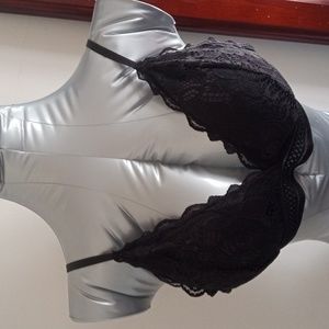 Extra large black bra made with stretchy fabric and has padding